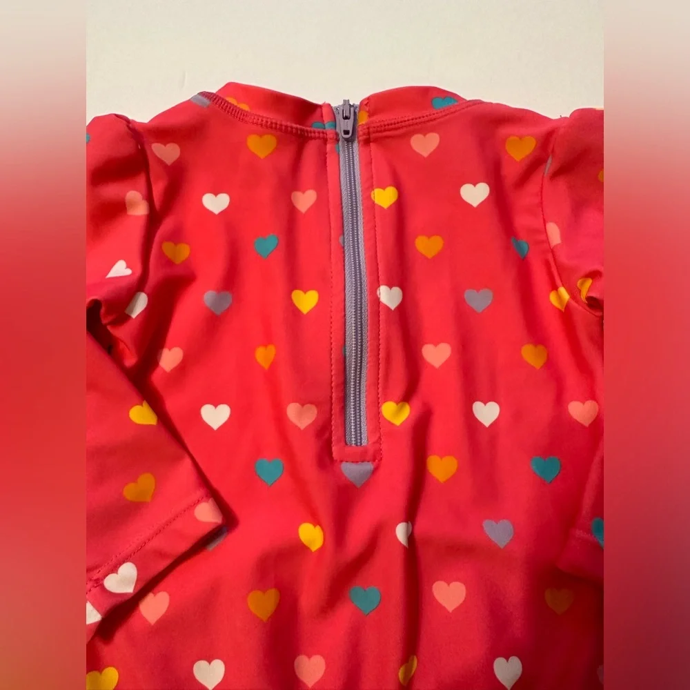 12-18M Ruffle Butts Coral Pink Heart Print Rash Guard